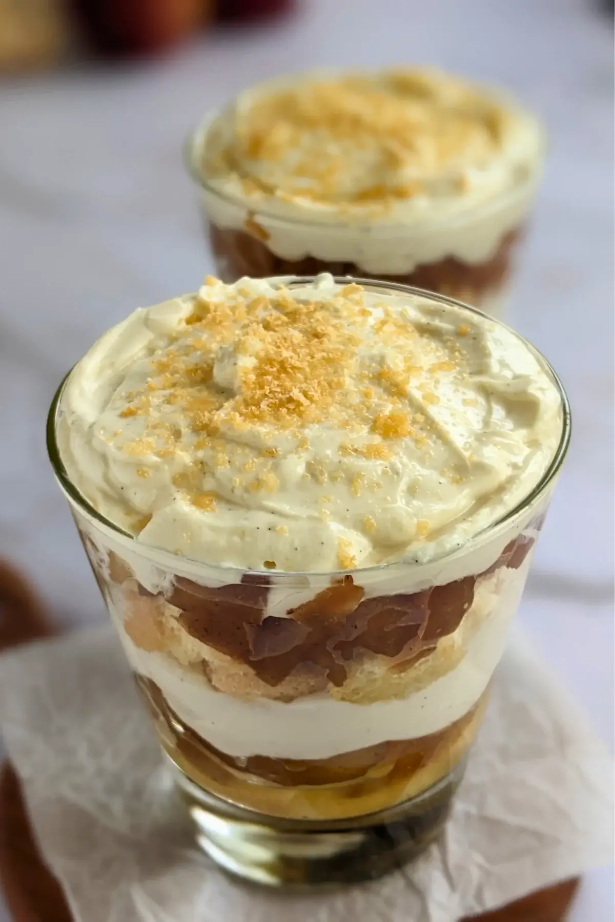 Layered apple tiramisu with creamy mascarpone and Greek yogurt filling.