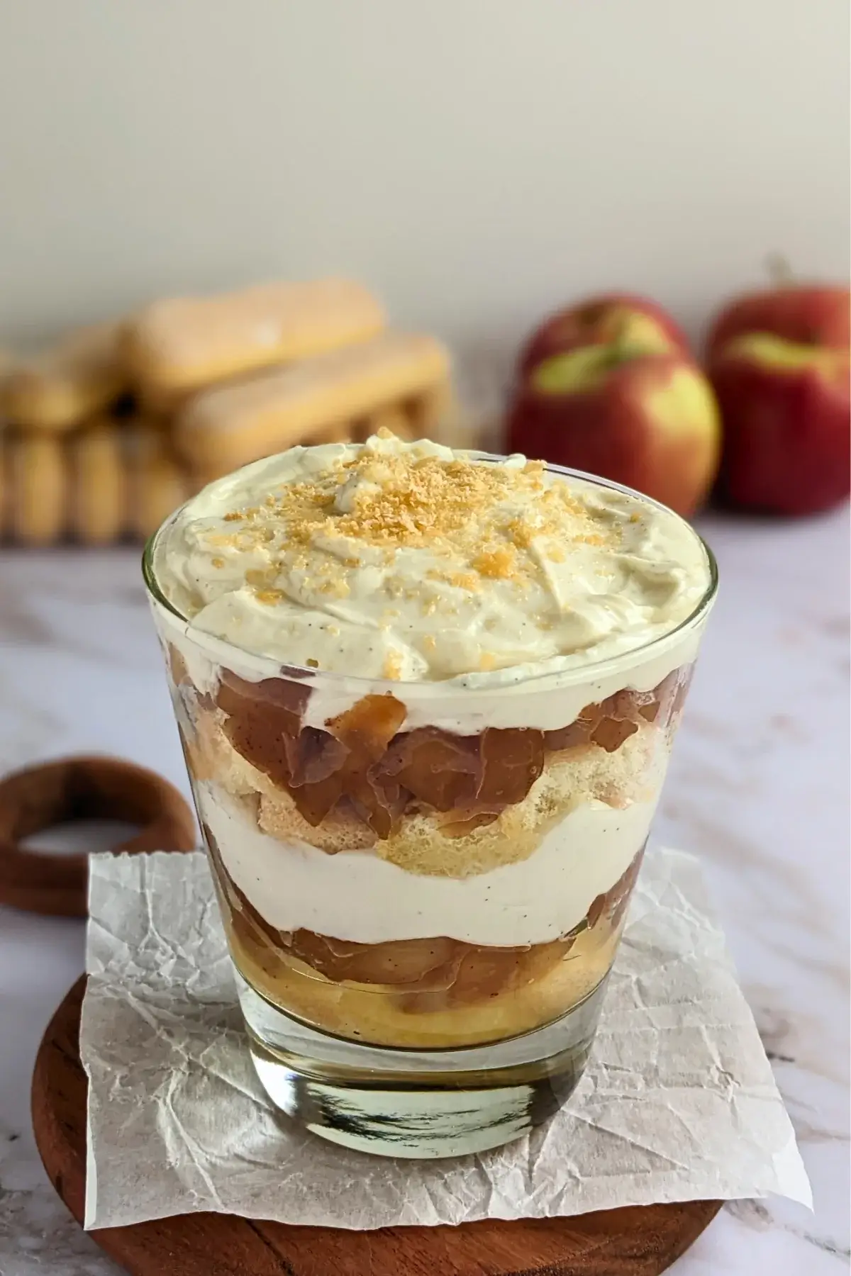 Layered dessert made with mascarpone, Greek yogurt, ladyfinger biscuits, and homemade applesauce, inspired by classic tiramisu.