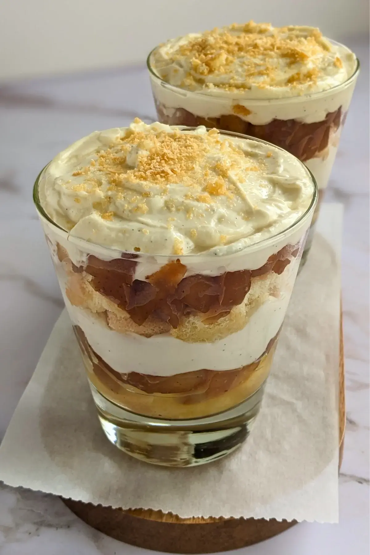 Layered apple tiramisu with creamy mascarpone and Greek yogurt filling.