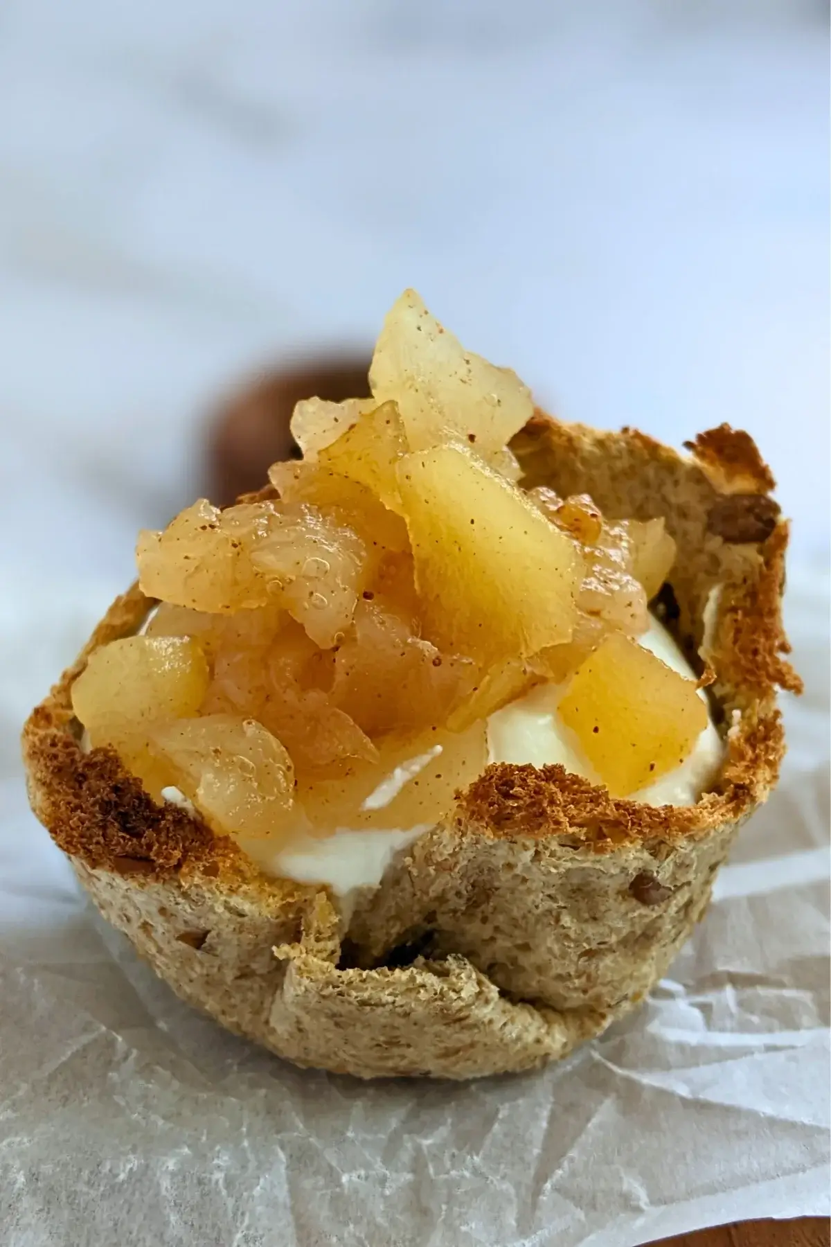 Toasted cups with creamy ricotta filling and a generous spoonful of spiced applesauce.