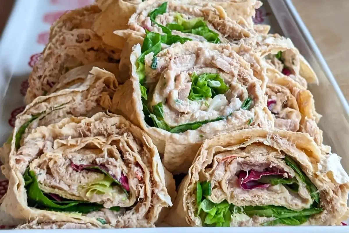 Tuna flatbread lavash rolls filled with a mix of tuna, mustard, Greek yogurt and fresh salad leaves.