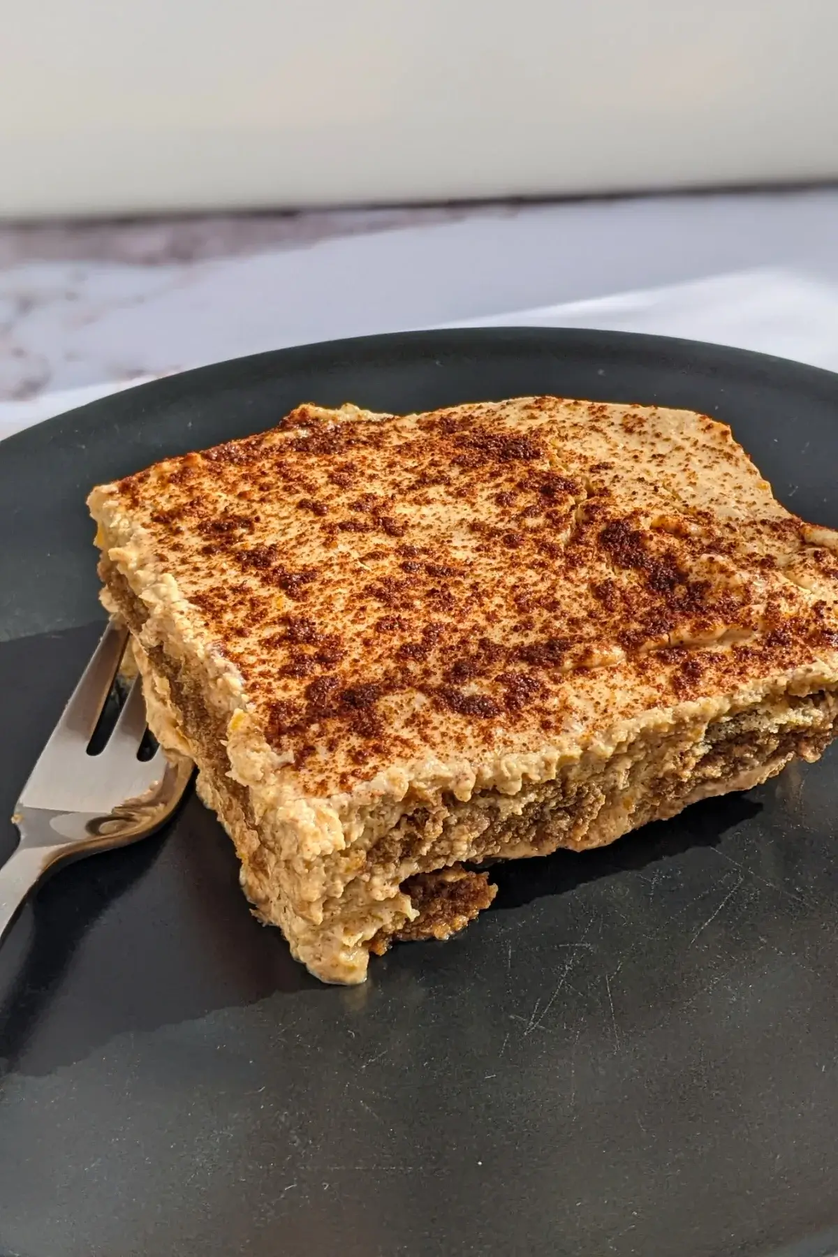Pumpkin Tiramisu - a low-fat, low-sugar pumpkin dessert made with mascarpone and Greek yogurt, sugar or sweetener, pumpkin puree, and ladyfinger biscuits. 
