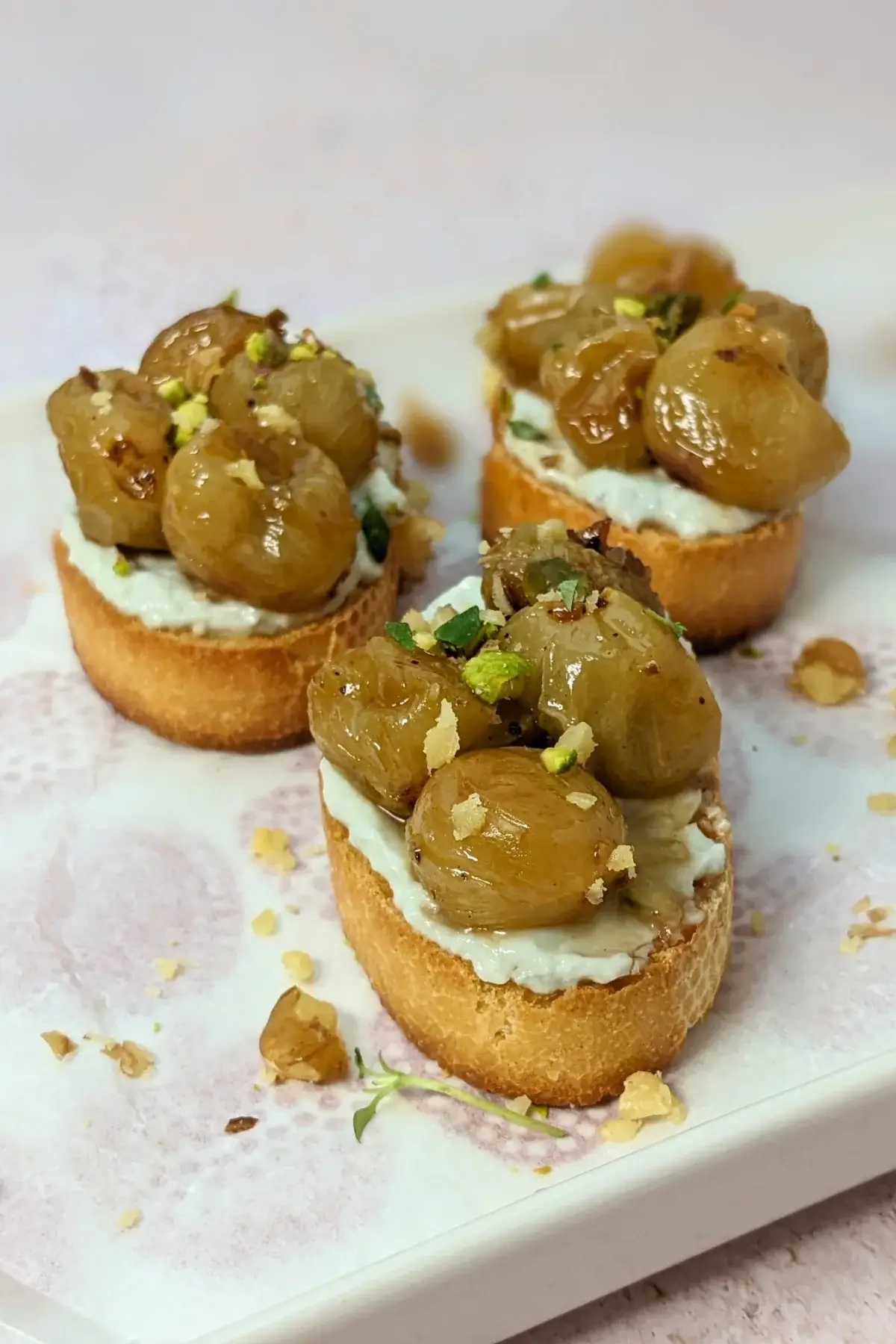Whipped Blue Cheese Crostini Appetizers With Roasted Grapes - Italian toasts with oven roasted grapes and whipped blue cheese.