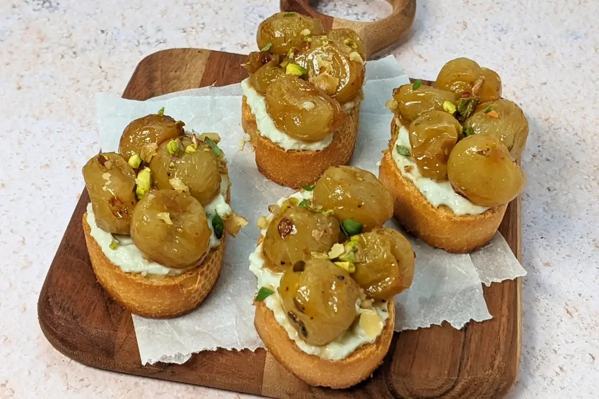 Whipped Blue Cheese Crostini Appetizers With Roasted Grapes - Italian toasts with oven roasted grapes and whipped blue cheese.